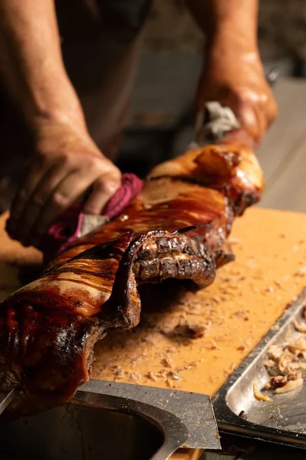 Spit-roasted Sardinian porcetto, carved by hand
